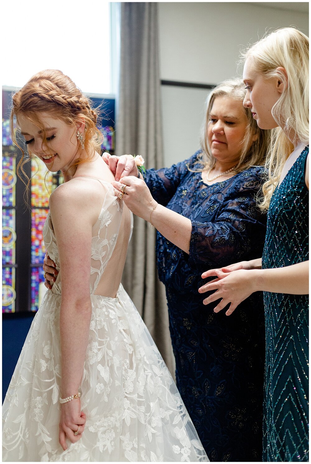 buttoning the wedding dress