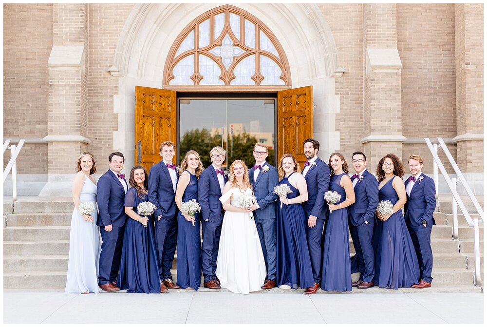 Bridal party outside of A Holy Family Cathedral Wedding.