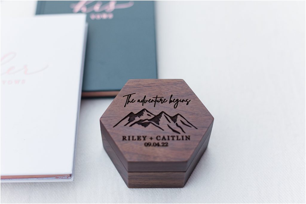 Bride and groom's ring box made of real wood, with hand carved mountain range on it. 
