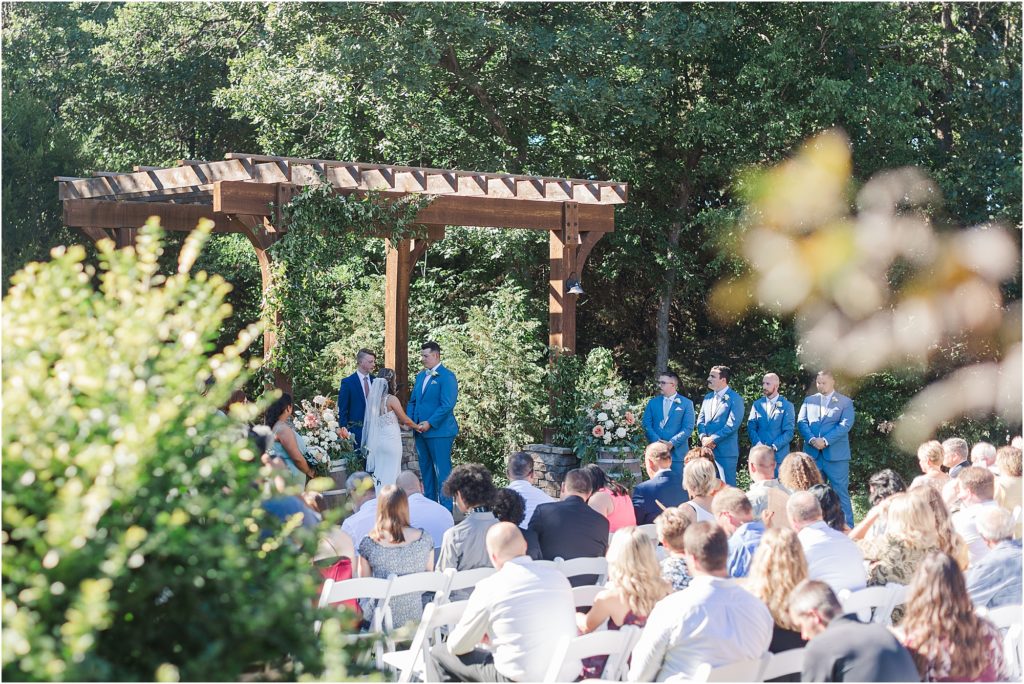 An outdoor wedding ceremony at Eleven Oaks Ranch.