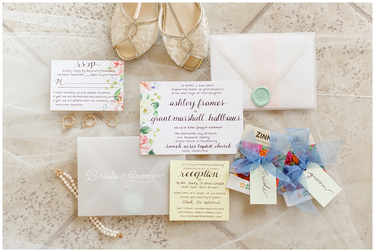 Pretty bridal details with invitation suite and jewelry.