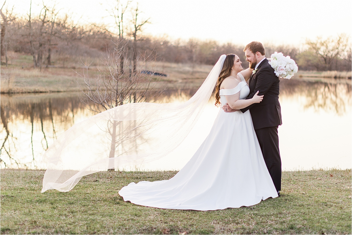 Bride and groom at Dream Point Ranch wedding by the pond.