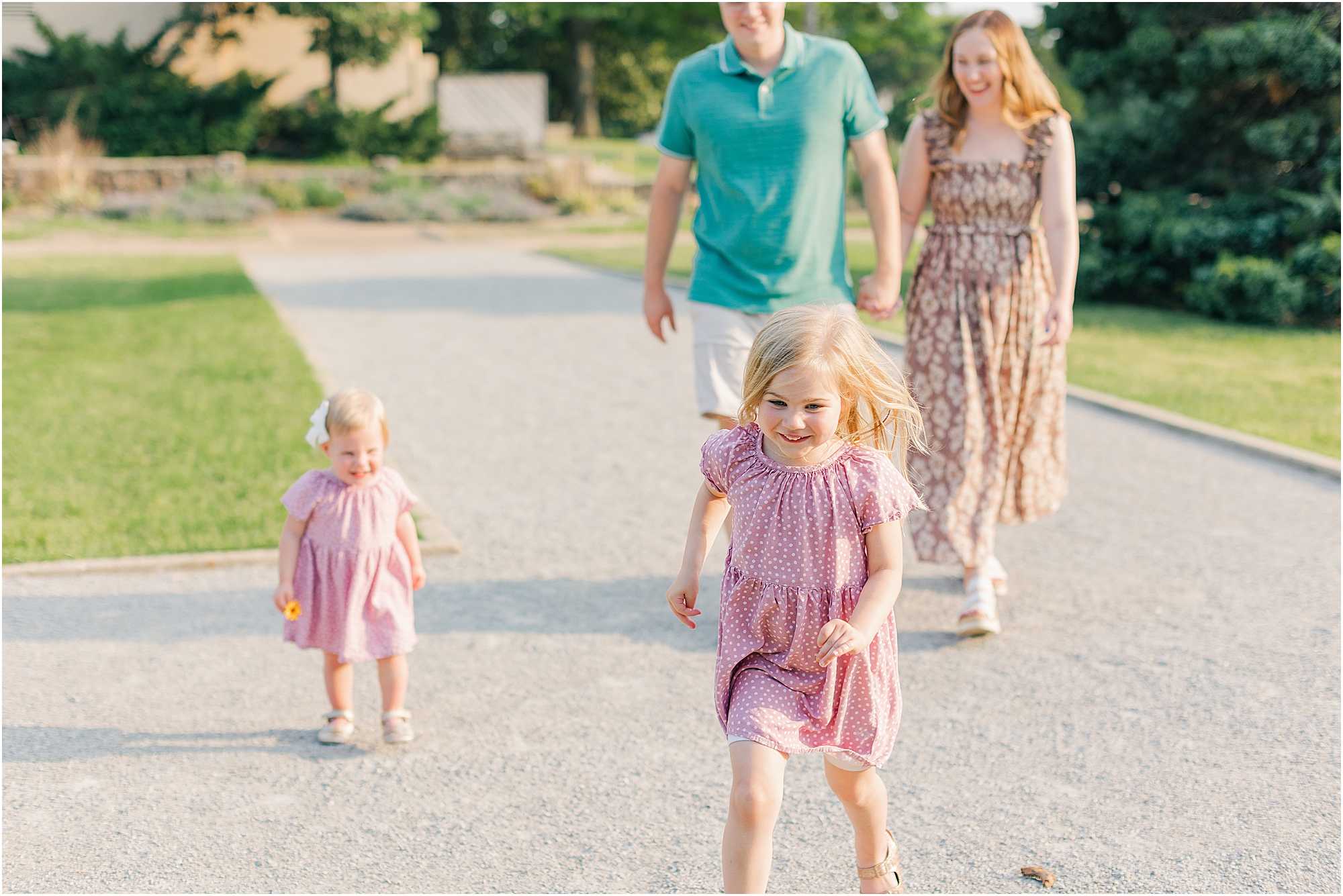 Running down the path during a summer family photo session.