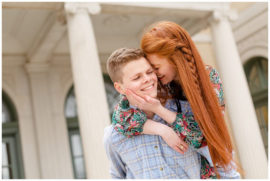 Grant and Ashley laughing at the mansion at woodward park during their engagement photos. 
