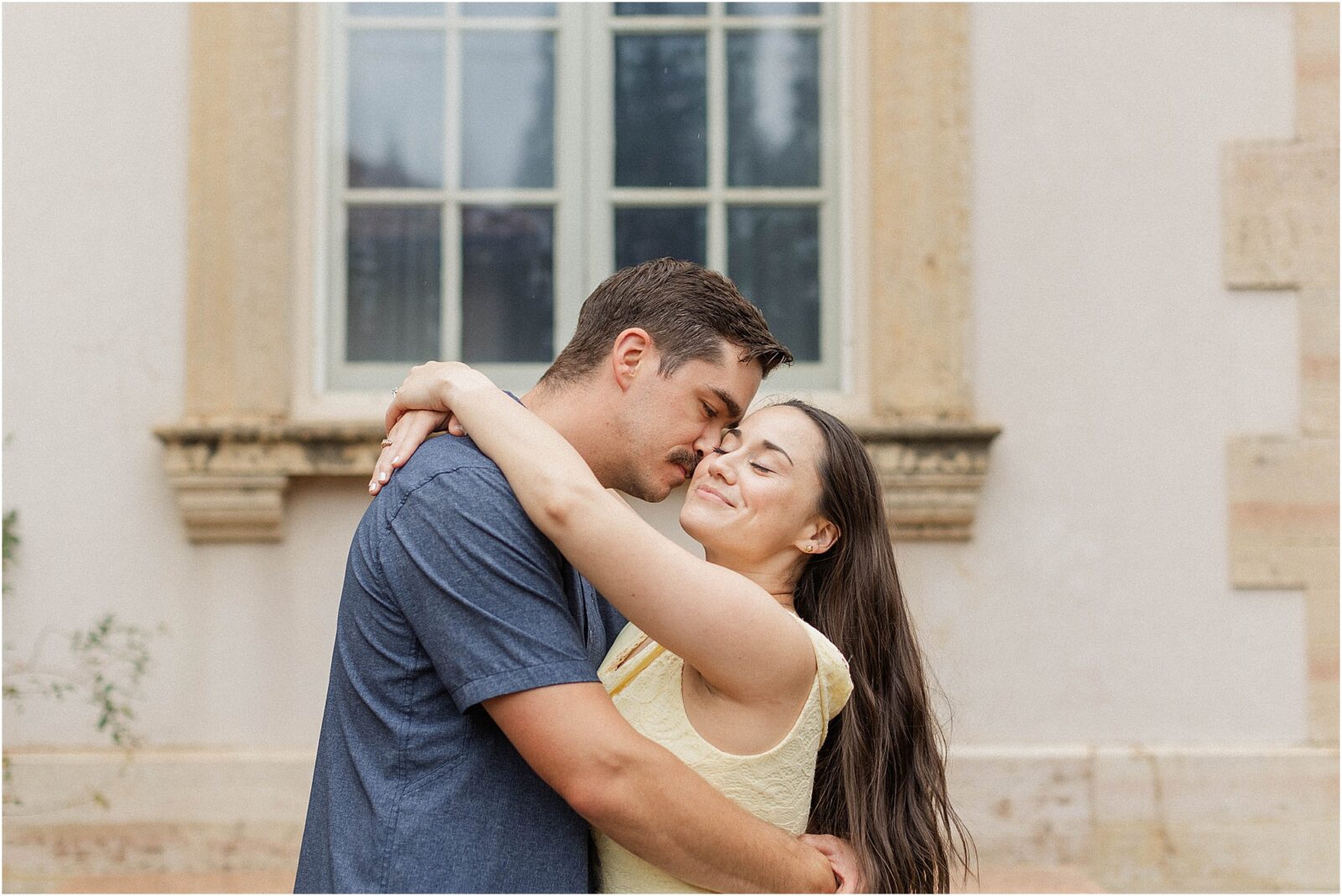Fine art wedding photograph of Marie and Mark during their rainy engagement session at the philbrook