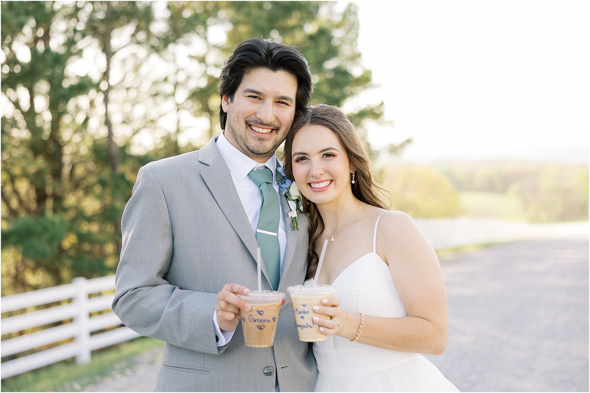 Bride and groom enjoying their coffee from Bold and Brave Coffee Bar at Lakeview Hills wedding venue on a glowy Spring day.